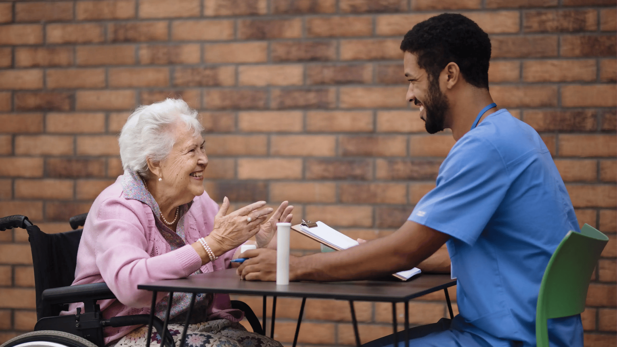 caregiver-explaining-taking-pills-to-senior-woman-2024-10-18-08-31-13-utc-1