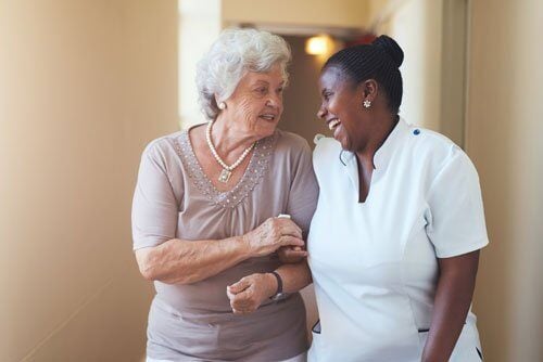 nurse-and-woman-walking-2