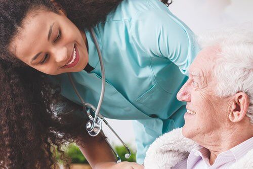 Nurse And Elderly Man