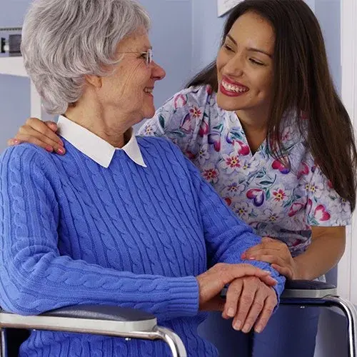 Nurse And Elderly Woman