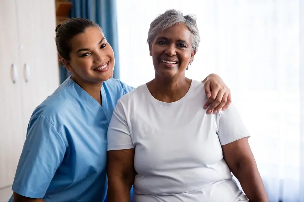 Nurse And Elderly Woman