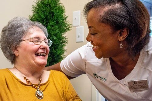 Nurse And Elderly Woman